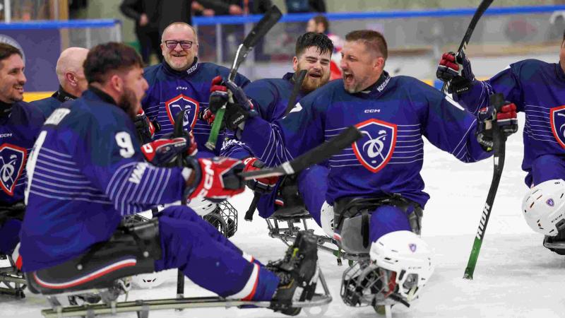 Para ice hockey players celebrate 