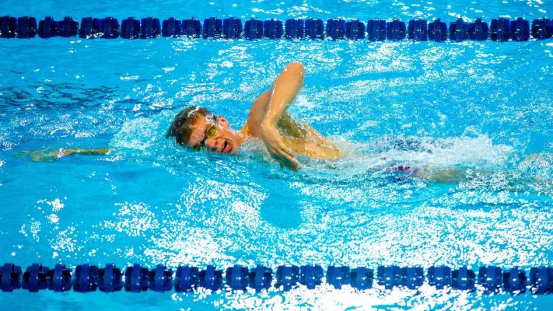 A male swimmer in a competition