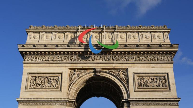 The Paralympic symbol, known as the Agitos, installed on top of the French monument Arc de Triomphe in Paris