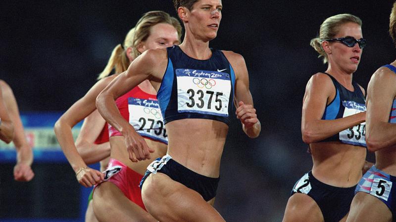 A group of female athletes running at Sydney 2000 Olympics