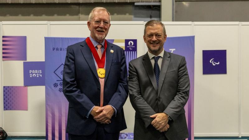 David Hadfield and Andrew Parsons smiling together at the camera