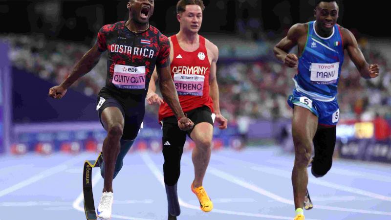 An athlete celebrate after winning