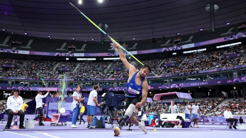 A male javelin thrower with a prosthetic leg competing at Paris 2024 Paralympics