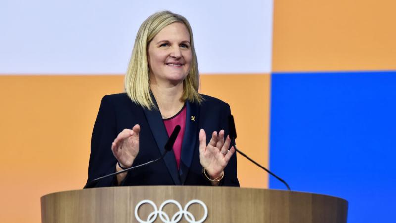 A female official is speaking in a press conference.