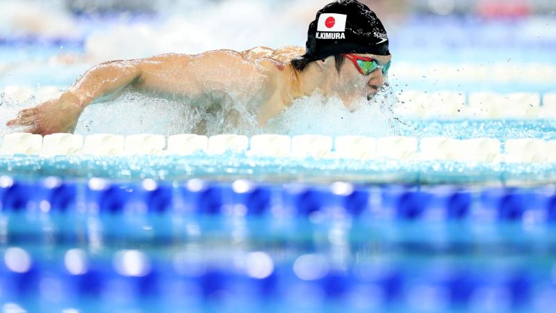 A Para swimmer in action