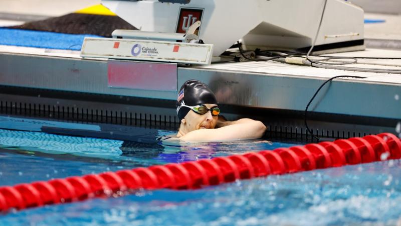 A female Para swimmer inside the pool