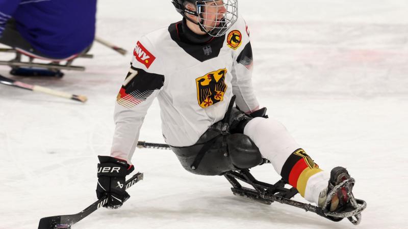 A Para ice hockey player from Germany in a game