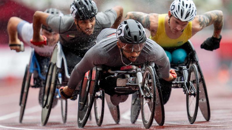 Wheelchair racers in action