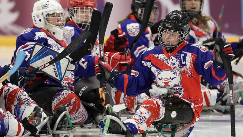 A group of female players of the Great Britain national team on ice