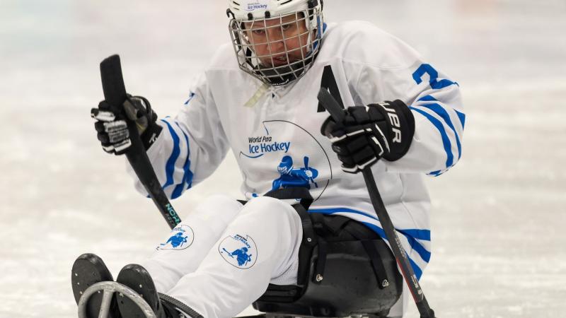 A female Para ice hockey player during a game