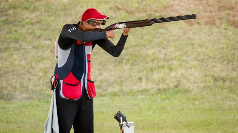 A male Para trap shooter in a competition
