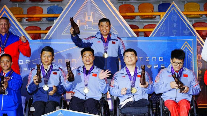 Athletes celebrate on podium