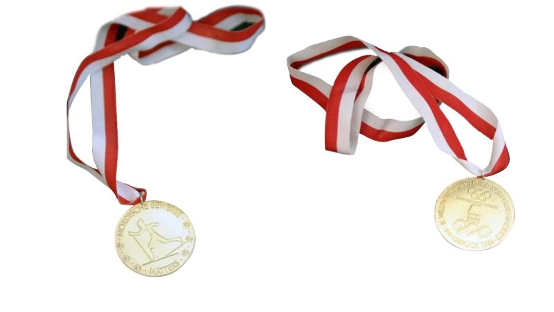 The front and back of the Innsbruck 1984 gold medal