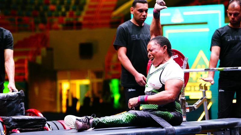 An athlete celebrates in joy