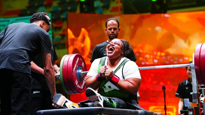 An athlete celebrates in joy