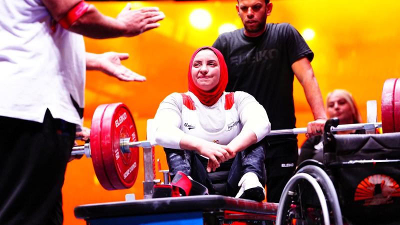 An athlete reacts after her lift