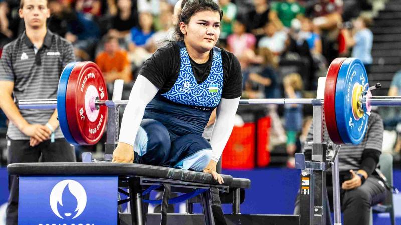 An athlete reacts after a lift 