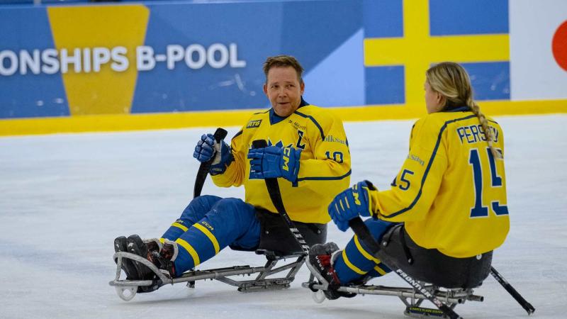 Para Ice hockey athletes in action