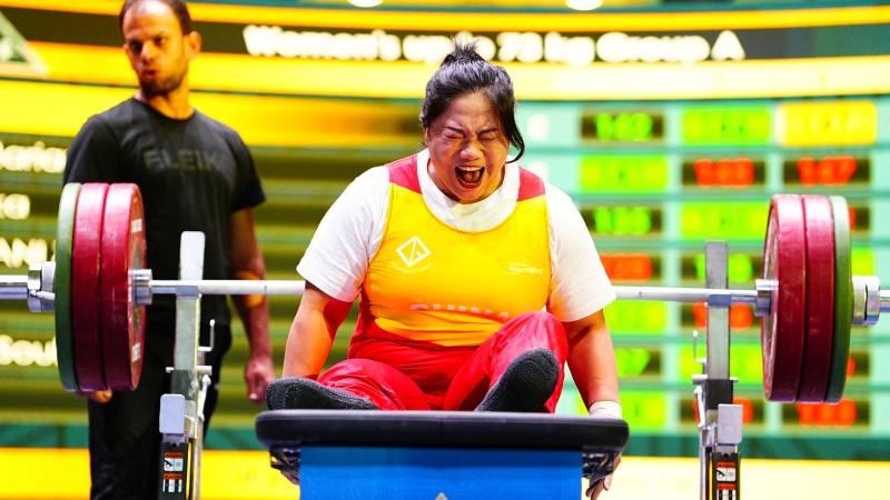 An athlete reacts on the bench
