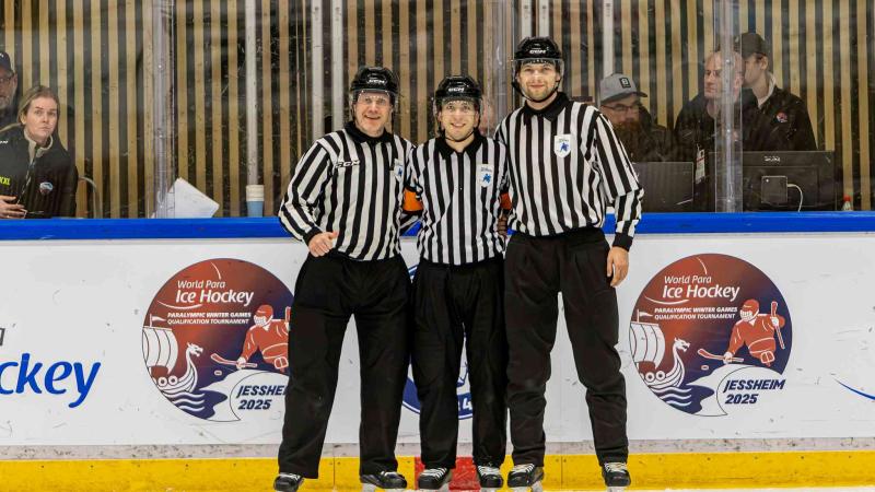 Officials pose after a match