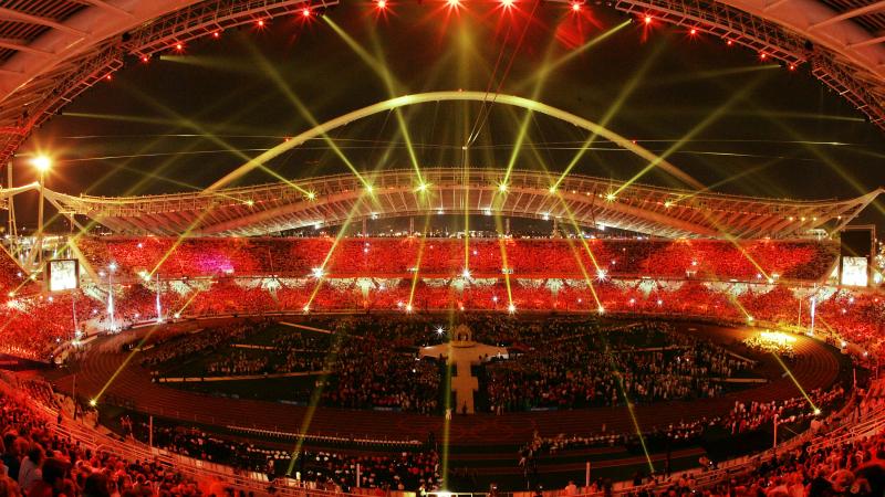 ATHENS - SEPTEMBER 28:  The lights at Olympic Stadium turn red symbolizing the handover of the Paralympic games to Beijing during the closing ceremonies for the 2004 Paralympic Games September 28, 2004  in Athens, Greece. (