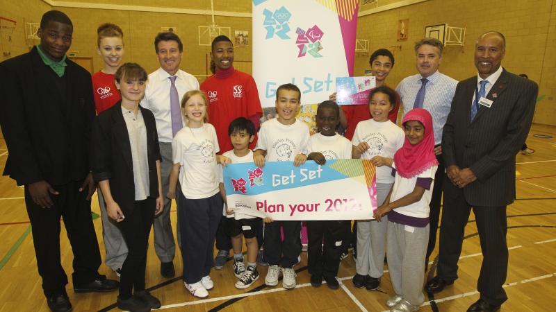 Children from a London school receiving a grant