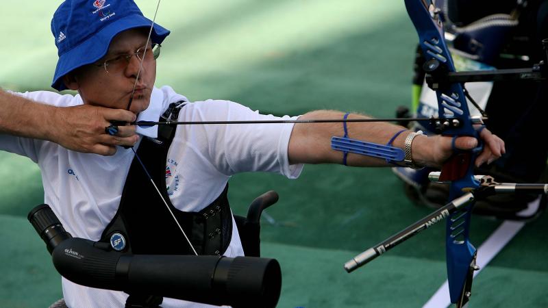 Athlete practicing archery.