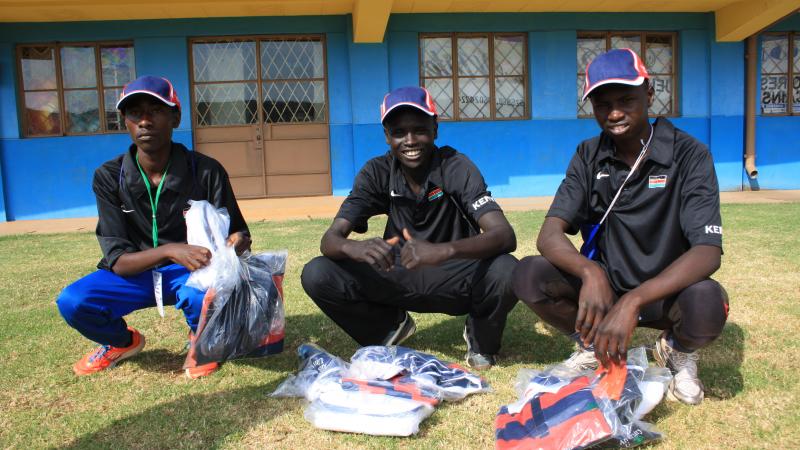 Three Kenyans opening welcome packs