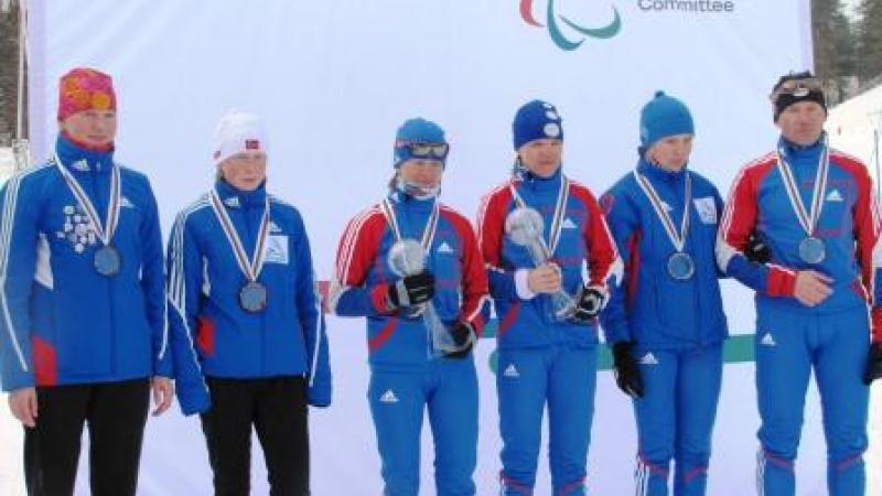 Three women on podium