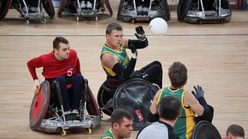 Wheelchair rugby players in action