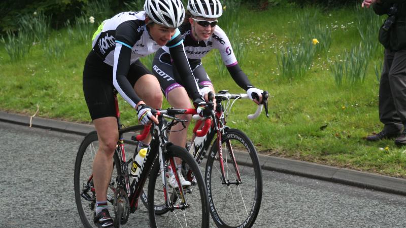 2 athletes cycling during a race