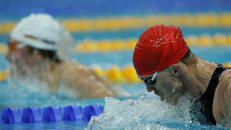Uladzimir Izotau of Belarus competes in Swimming Men final 100M Breaststroke A picture of a man swimming