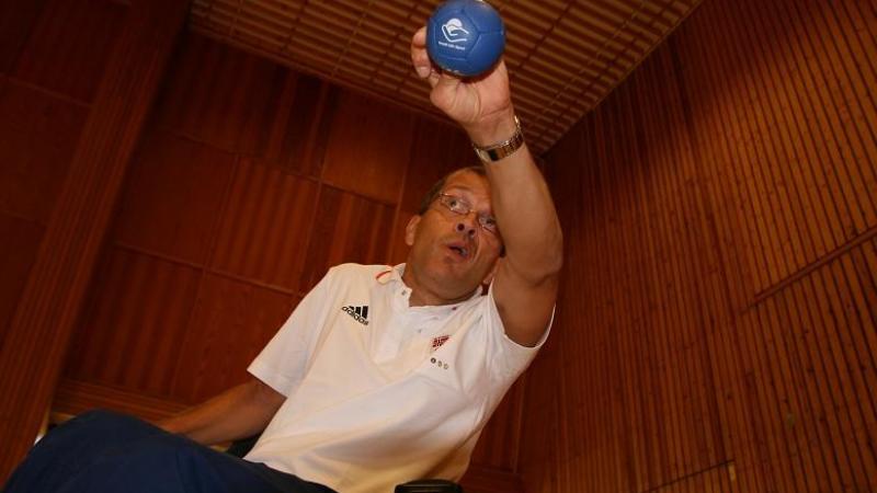 A picture of a man playing Boccia