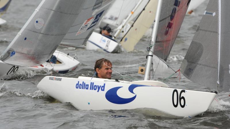 sailor in single-person keelboat