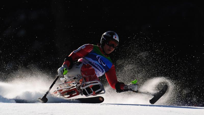 A picture of a woman skiing