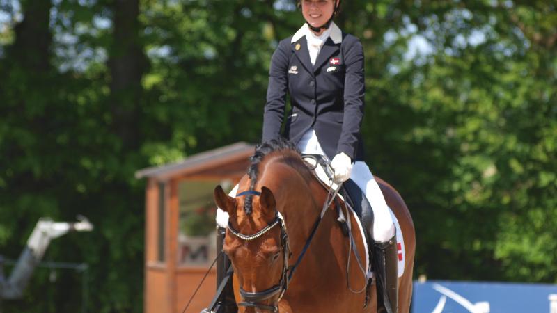 A picture of a woman riding