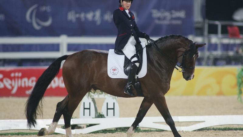 A picture of a woman riding