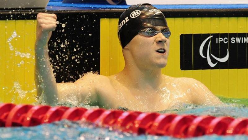 Great Britain's Ollie Hynd pumps his fist in the air after a top swim.