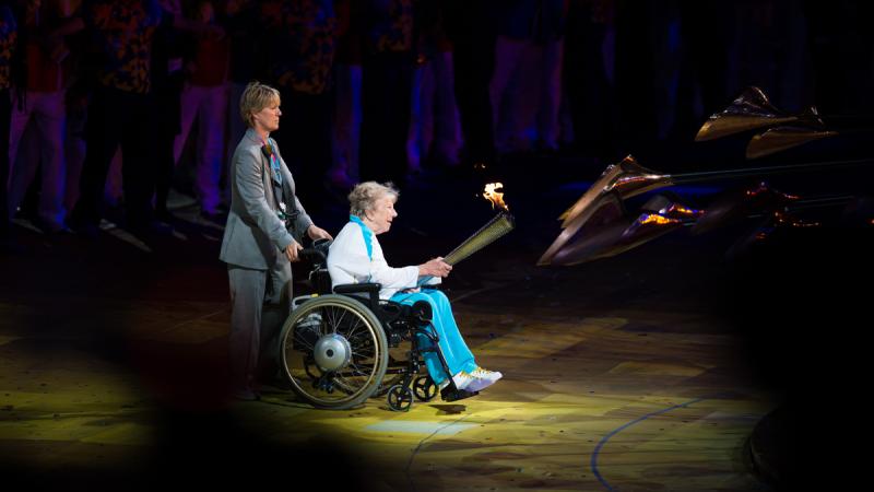 Margaret Maughan lights the Cauldron