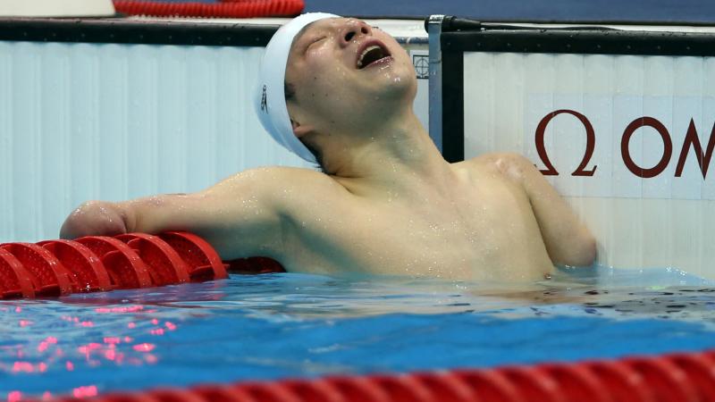 China's Qing Xu celebrates London 2012 gold