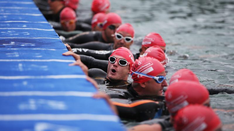 A picture of men ready to swim 