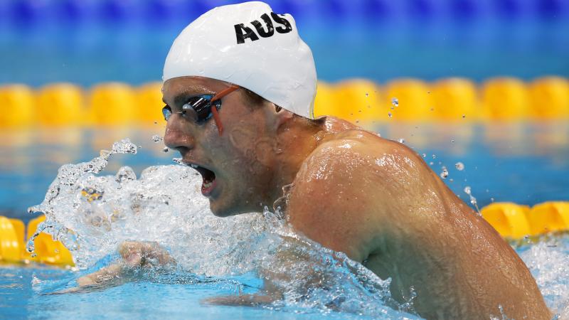 A picture of a man swimming.