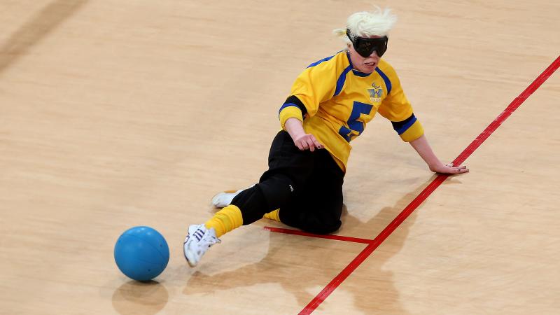 A picture of woman playing Goalball