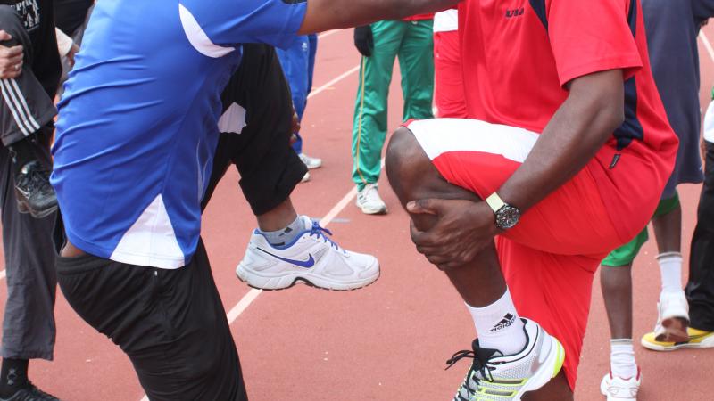 A picture of two athletes warming up