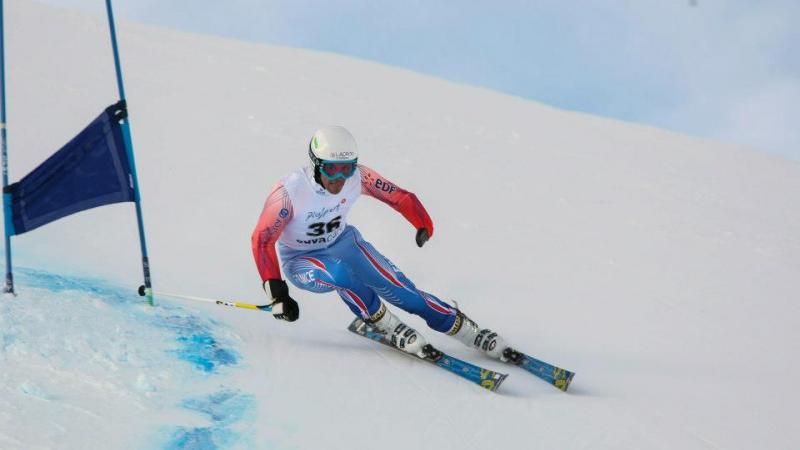 France's Vincent Gauthier-Manuel skiing slalom race at 2013 IPC Alpine Skiing World Cup in St Moritz, Switzerland