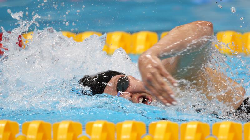 A picture of a woman swimming