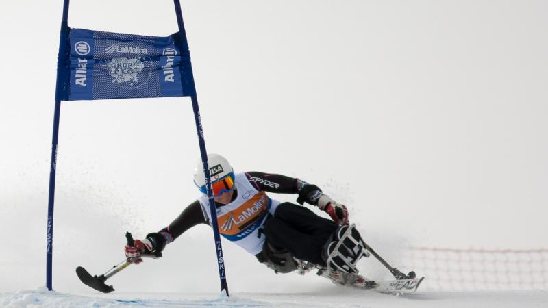 A picture of a woman skiing on the slopes