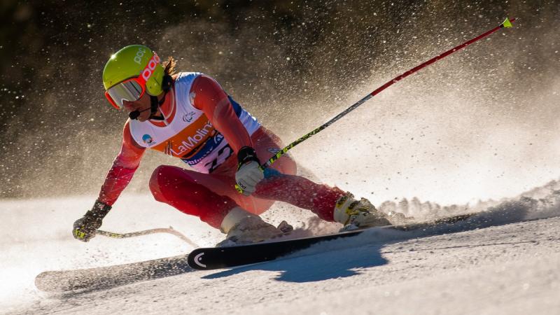 A picture of a man skiing on the slopes