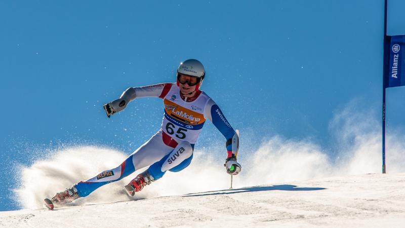 A picture of a man skiing on the slopes