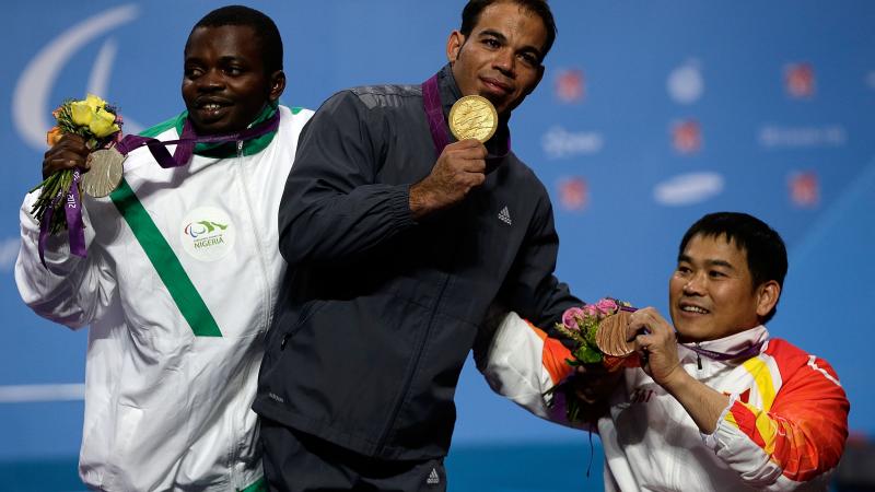 A picture of a man with a medal around his neck